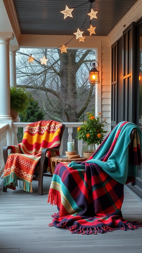 A cozy porch with two chairs, colorful blankets, and warm lighting.