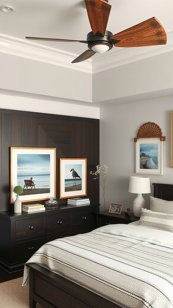 Coastal bedroom with dark wood furniture, beach-themed artwork, and a cozy bed.