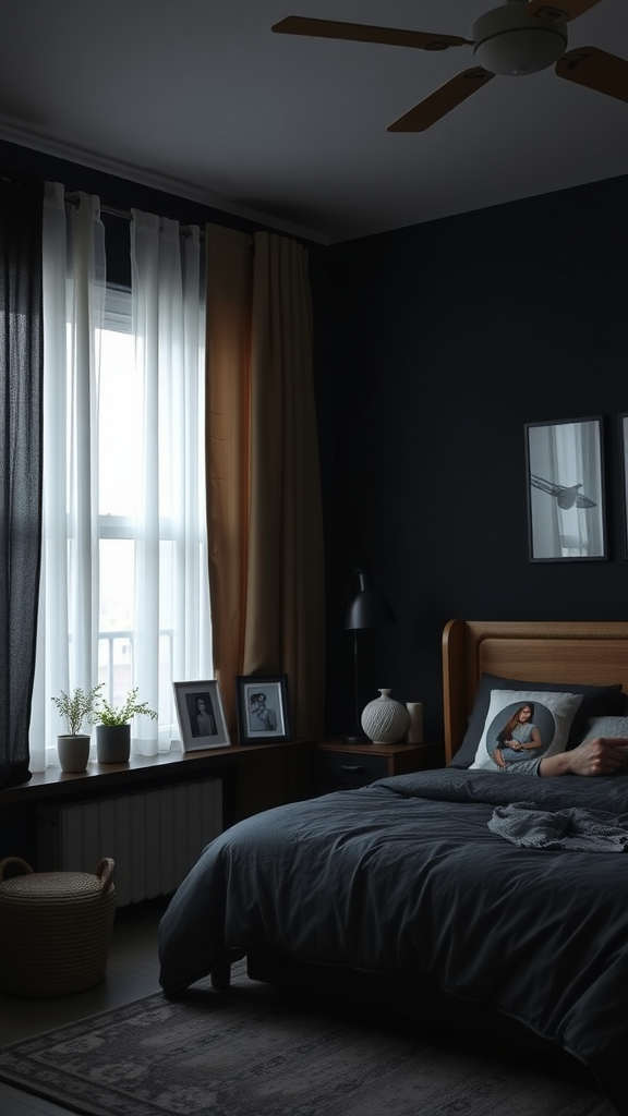 A cozy dark bedroom featuring a bed with gray bedding, framed photos on the window sill, and warm lighting.