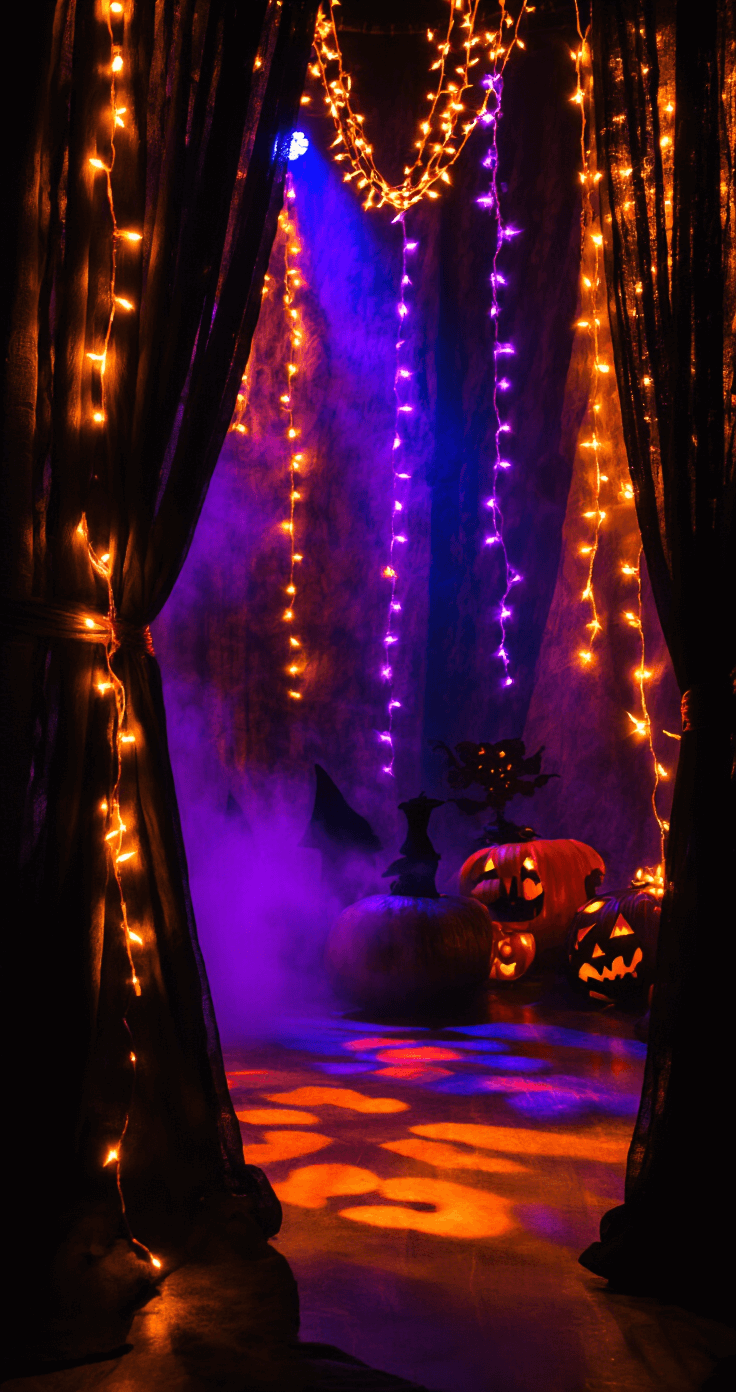 Trunk or Treat Ideas: Ultimate Guide to Creating an Epic Halloween Car Display A dramatic Halloween-themed interior shot featuring orange and purple string lights intertwined with black fabric, illuminated by LED spotlights and a fog machine creating an atmospheric haze, with decorative elements silhouetted against vibrant backgrounds.