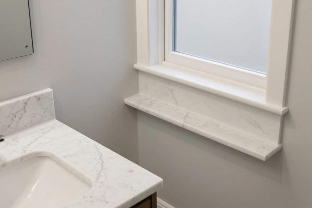 Quartz surfaces in tiny bathroom
